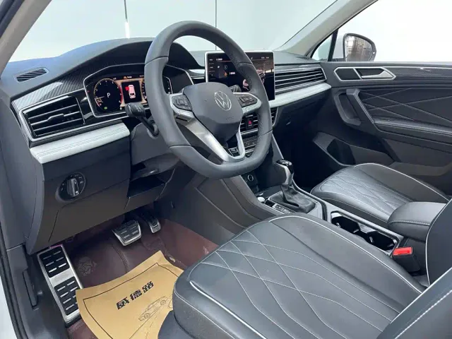 Volkswagen Tiguan L — Фото автомобиля 11