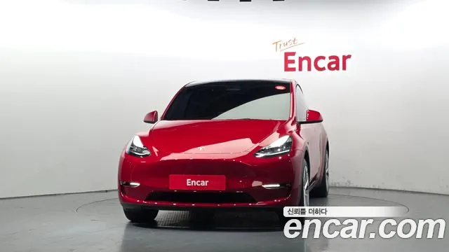 Tesla Model Y — Фото автомобиля 3