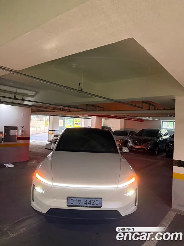 Tesla Model Y — Фото автомобиля 6