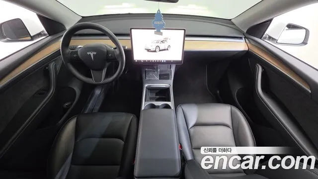 Tesla Model Y — Фото автомобиля 9