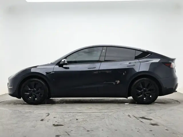 Tesla Model Y — Фото автомобиля 6