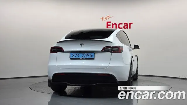 Tesla Model Y — Фото автомобиля 4