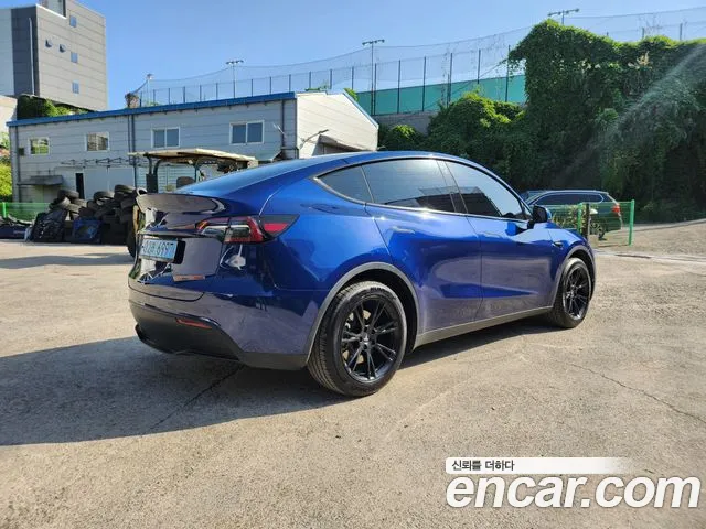 Tesla Model Y — Фото автомобиля 5