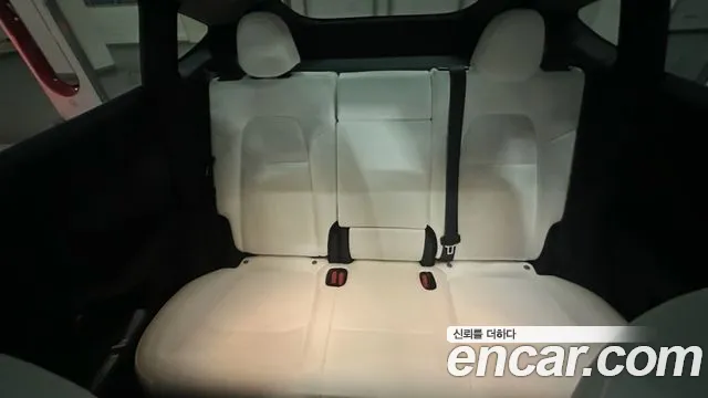 Tesla Model Y — Фото автомобиля 14
