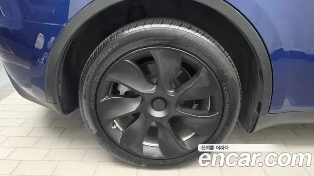 Tesla Model Y — Фото автомобиля 5