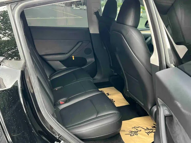 Tesla Model Y — Фото автомобиля 7