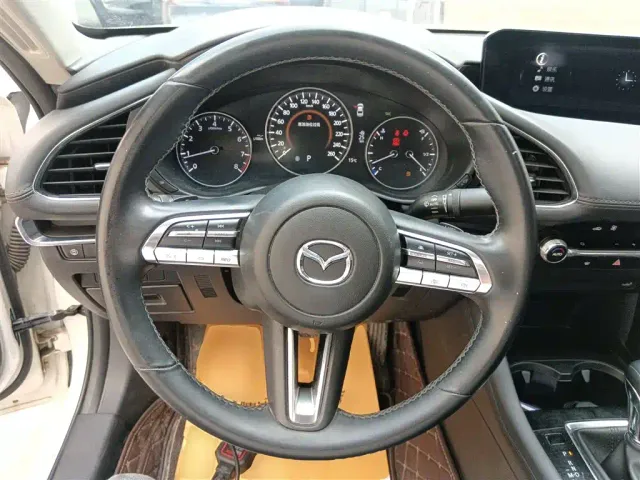 Mazda Axela — Фото автомобиля 6