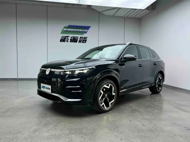 Volkswagen Tiguan L — Фото автомобиля 4