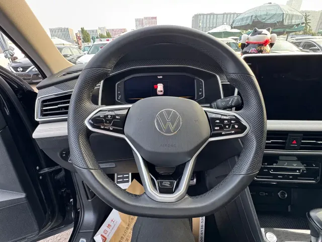 Volkswagen Tiguan L — Фото автомобиля 6