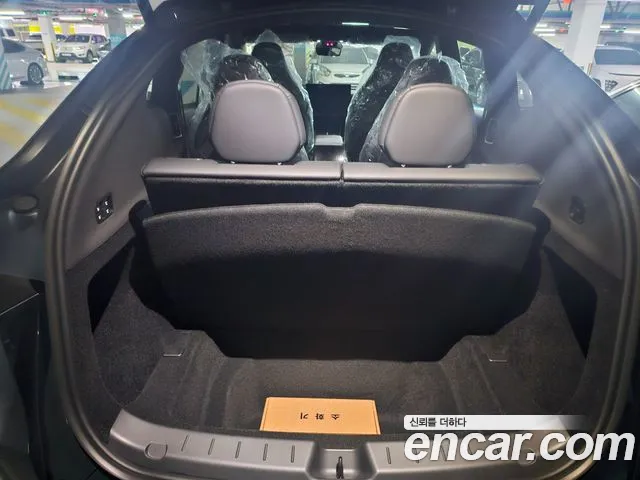 Tesla Model Y — Фото автомобиля 9