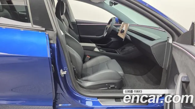 Tesla Model 3 — Фото автомобиля 11