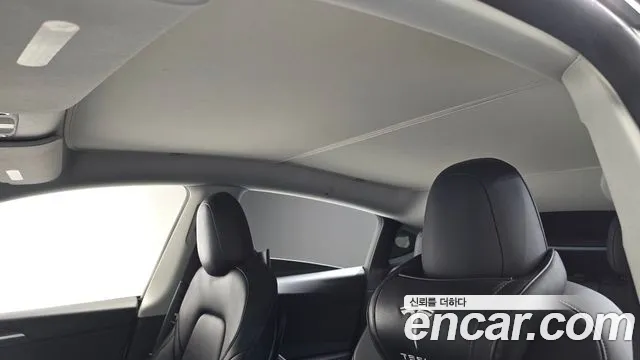Tesla Model Y — Фото автомобиля 15