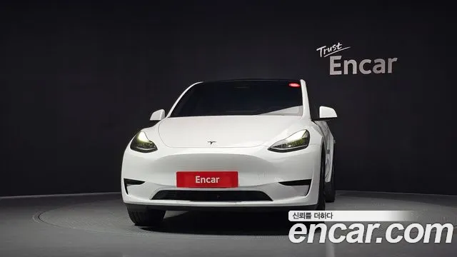 Tesla Model Y — Фото автомобиля 3
