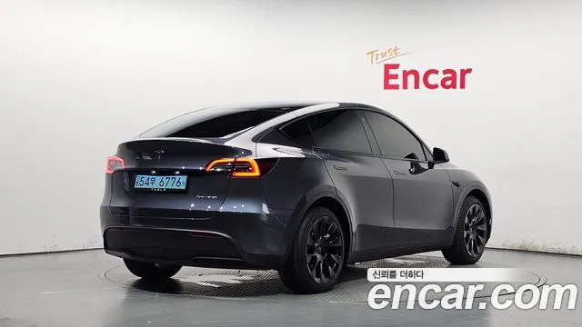 Tesla Model Y — Фото автомобиля 2