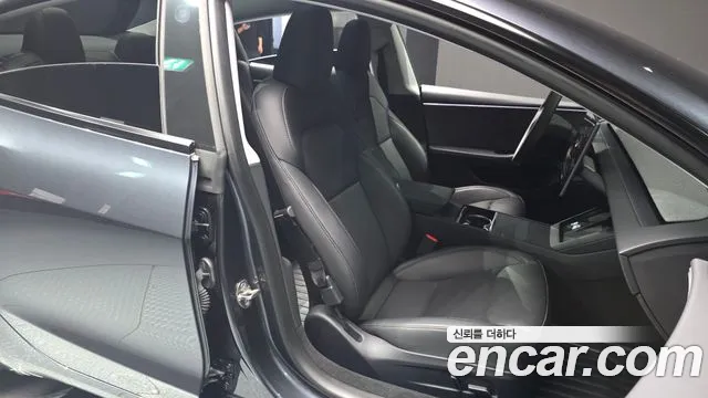 Tesla Model 3 — Фото автомобиля 23