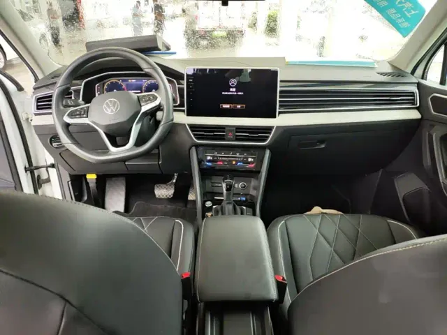 Volkswagen Tiguan L — Фото автомобиля 9