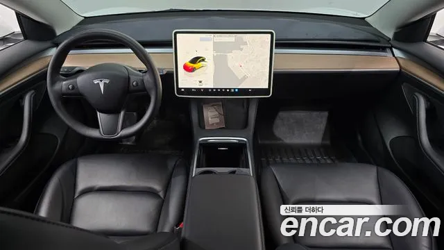 Tesla Model 3 — Фото автомобиля 10
