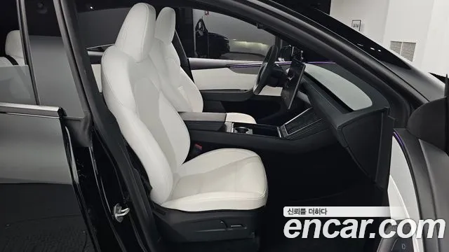 Tesla Model Y — Фото автомобиля 16