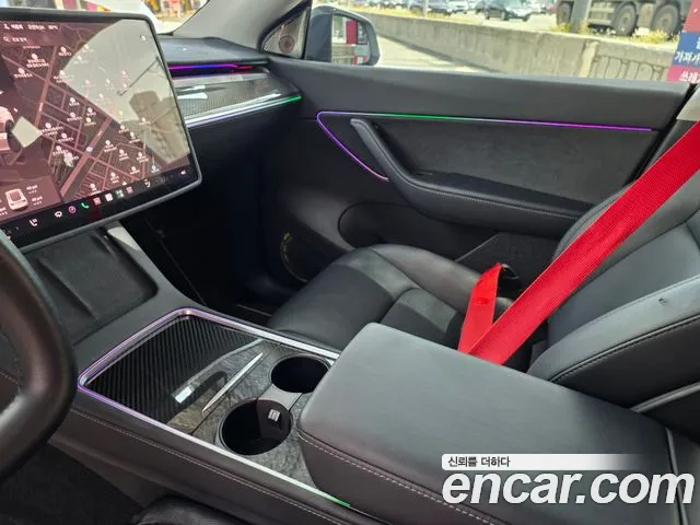 Tesla Model Y — Фото автомобиля 9