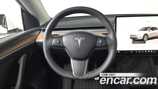 Tesla Model Y — Фото автомобиля 19