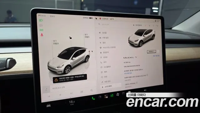 Tesla Model Y — Фото автомобиля 8
