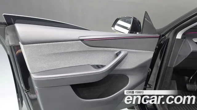 Tesla Model Y — Фото автомобиля 13
