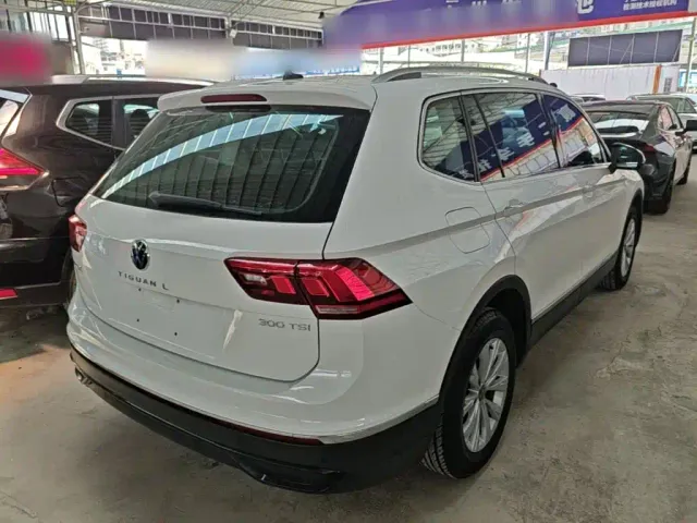 Volkswagen Tiguan L — Фото автомобиля 6