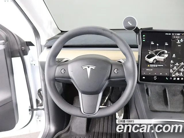 Tesla Model Y — Фото автомобиля 16
