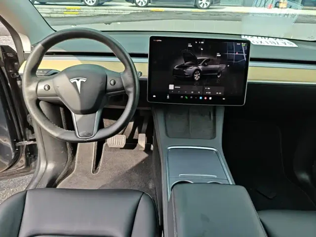 Tesla Model Y — Фото автомобиля 9
