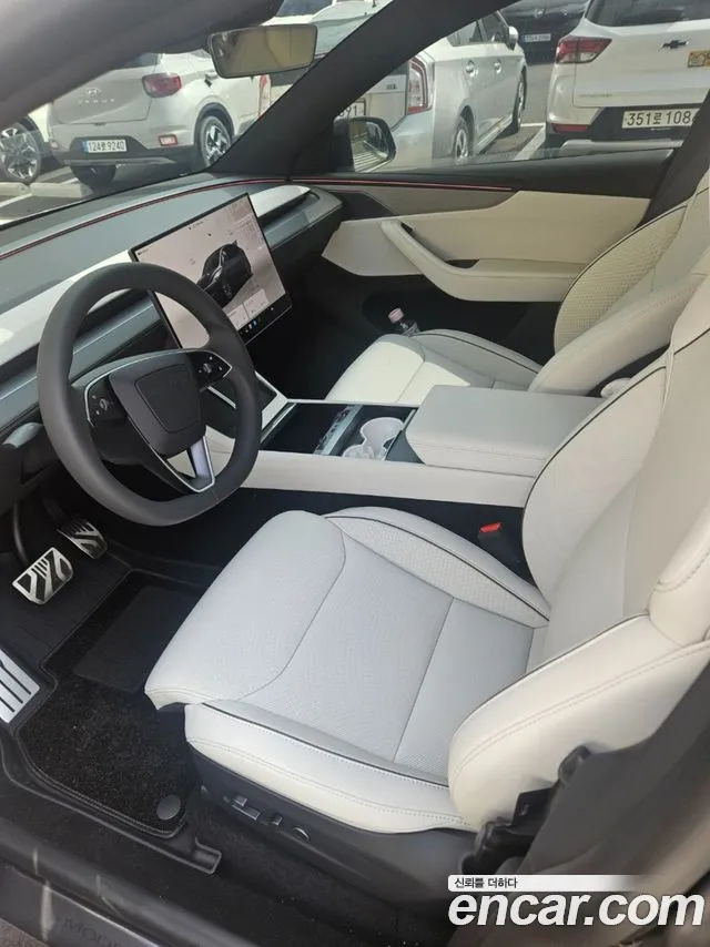 Tesla Model Y — Фото автомобиля 5