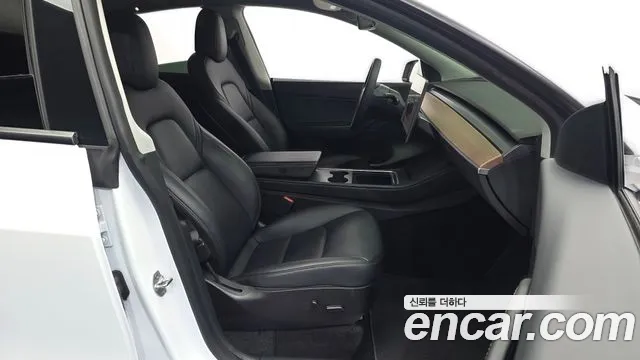 Tesla Model Y — Фото автомобиля 23