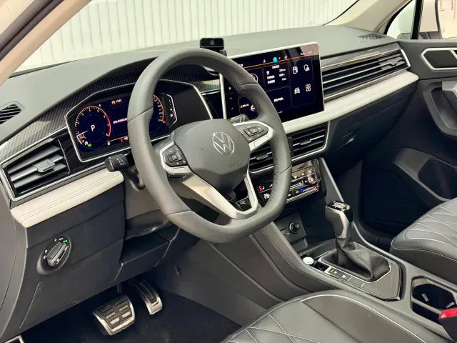 Volkswagen Tiguan L — Фото автомобиля 24