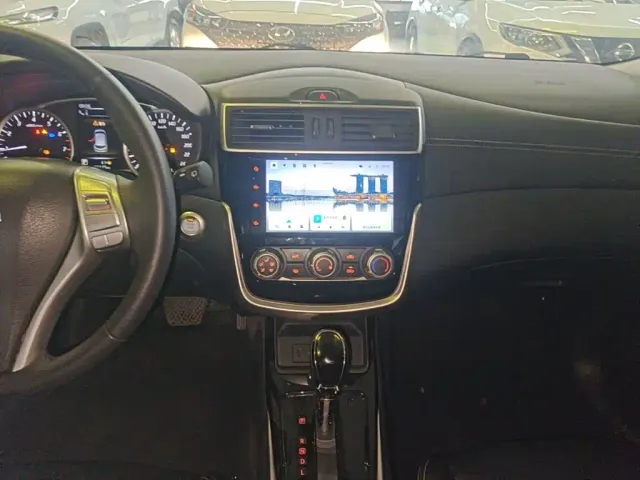 Nissan Tiida — Фото автомобиля 12