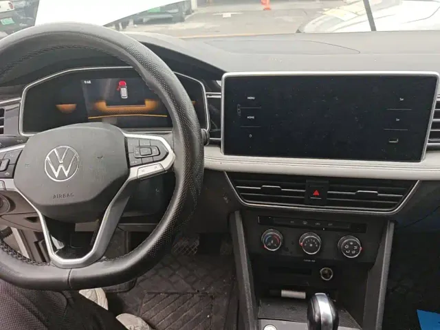 Volkswagen Tiguan L — Фото автомобиля 9