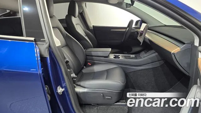 Tesla Model Y — Фото автомобиля 16