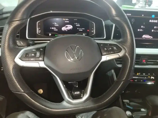 Volkswagen Tiguan L — Фото автомобиля 10