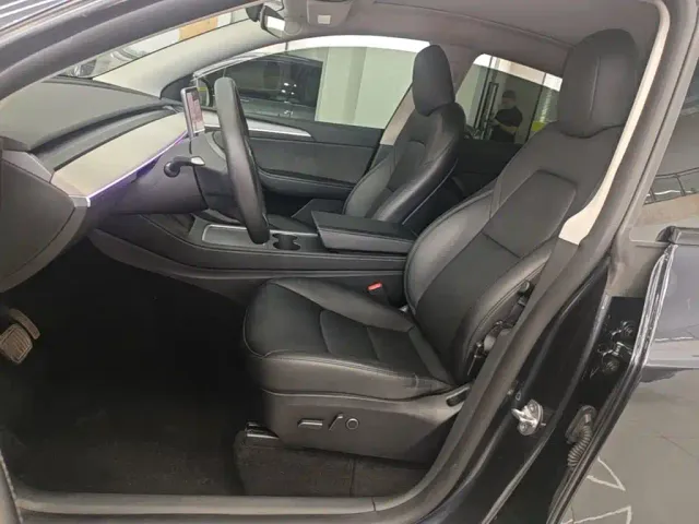 Tesla Model Y — Фото автомобиля 14