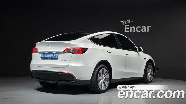 Tesla Model Y — Фото автомобиля 2