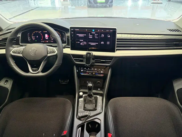 Volkswagen Tiguan L — Фото автомобиля 6