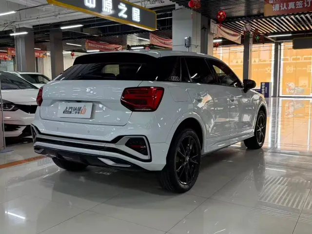 Audi Q2L — Фото автомобиля 7