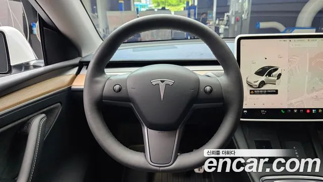 Tesla Model Y — Фото автомобиля 19