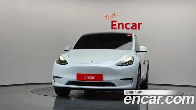 Tesla Model Y — Фото автомобиля 3