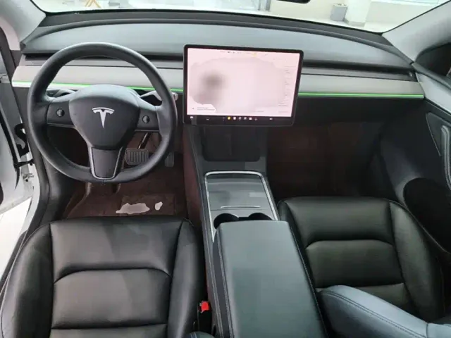 Tesla Model Y — Фото автомобиля 9