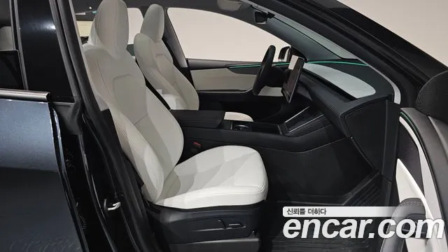 Tesla Model Y — Фото автомобиля 19