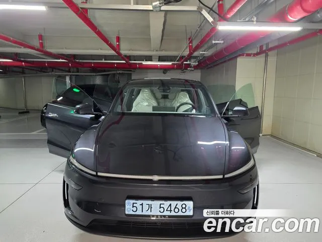 Tesla Model Y — Фото автомобиля 15