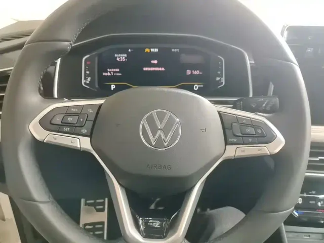 Volkswagen Tiguan L — Фото автомобиля 10