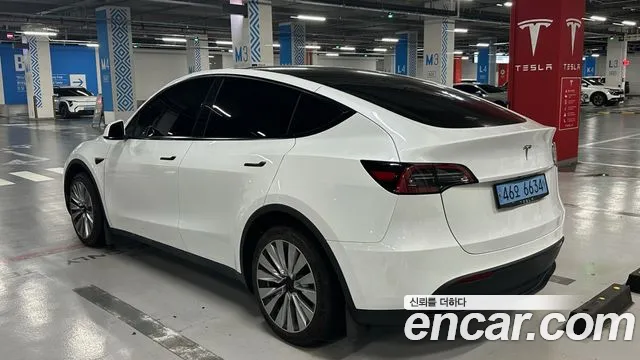 Tesla Model Y — Фото автомобиля 2