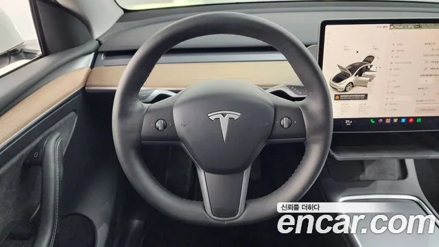 Tesla Model Y — Фото автомобиля 21