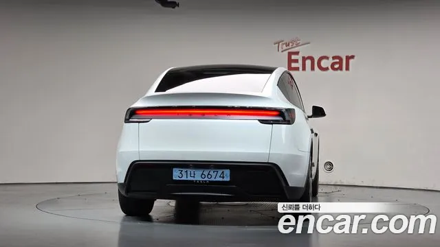 Tesla Model Y — Фото автомобиля 4