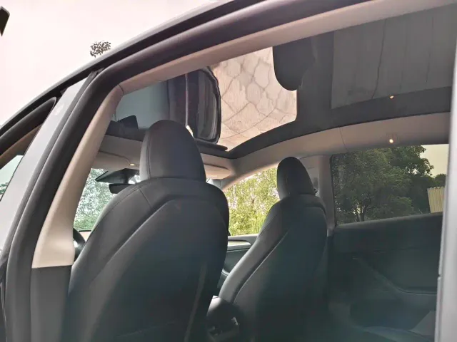Tesla Model Y — Фото автомобиля 16